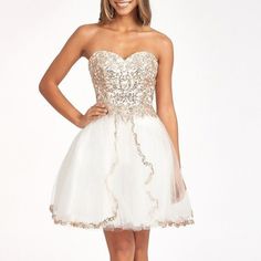 Glitter And Sequin Embellished Bodice Sweetheart Mesh Homecoming Dress For The Most Cutest Girl In The World! This Sequin Embellished Mesh Short Dress Is Decorated With Sparkly Glitter In Splendid Pattern. Strapless Sweetheart Neckline Add Romantic Touch, And Wide Open Lace-Up Back Offers Chic Vibe To Your Look. Color Off White Fabric: Mesh Length: Short Neckline: Sweetheart Sleeve: Strapless Back: Corset, Lace Up Embellishment: Glitter, Sequin Silhouette: Babydoll Elegant Dresses For Debutante Ball And Party Season, Sequin Dress With Sweetheart Neckline For Debutante Ball, White Glamorous Mini Dress For Prom Season, Glamorous White Mini Dress For Prom Season, White Glamorous Mini Dress For Prom, White Dresses For Prom Season With Sweetheart Neckline, Glamorous White Mini Dress For Prom, White Sweetheart Neckline Dress For Debutante Ball, White Dresses With Sweetheart Neckline For Prom