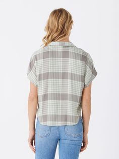 The Sheena Woven Button Up is crafted from 100% sustainable lenzing viscose for guilt-free fashion. It features a drop shoulder design and tie front detail, adding an elevated and stylish touch to any outfit. Free Fashion, Guilt Free, Shoulder Design, Seychelles, Drop Shoulder, Button Up, Plaid, Fabric, Design