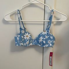 Never Worn And In Perfect Condition. So Cute And Light Blue With Daisies. Beach Season Bra For Pool, Casual Beach Bra For Spring, Summer Underwire Bra For Vacation, Summer Vacation Bra With Padded Cups, Blue Bra-friendly Swimwear For Vacation, Floral Print Underwire Bra For Beach, Floral Print Underwire Bra, Light Blue Summer Swimwear, Bra Friendly, Light Blue Summer Swimwear Bra Friendly