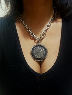 "♦ A silver link chain necklace, made of silver-plated brass with a black zircon, The necklace is designed in a chic style decorated with Largth coin pendant. SIZE: length 15.8\"(40cm) up to 19.9\"(50 cm) width coins 1.96\" (6 cm) width chain: 0.39\" (1cm) ♦ This piece of jewelry is perfect as a gift for yourself, for a wedding day, Valentine's Day, beach, Festival or a birthday. If you're interested in sending a gift to a third party, just write your message to the recipient and I will do so wi Silver Chain Medallion Jewelry, Silver Medallion Chain Jewelry, Elegant Silver Round Pendant Coin Necklace, Silver Medallion Coin Necklace With Chain, Sterling Silver Coin Pendant Chain Necklace, Silver Chain Necklace With Coin Pendant, Elegant Coin Medallion Necklace With Adjustable Chain, Metal Medallion Chain Necklace With Adjustable Chain, Metal Medallion Necklace With Adjustable Chain