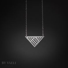 Triangle necklace - silver Geometric triangle with strips pattern pendant, its bound to be loved by the modern gal who loves fashion and minimalist design.    ★ Comes in our signature gift box, ready for gift giving.  ★ Available in Silver [Sterling silver chain & silver plated pendant]  ★ Pendant size : 1.30"x0.70" .  Thanks for shopping at ByYaeli♥  All images, texts & products are property of ByYaeli ©2017 Modern Triangle Jewelry For Gift, Silver Triangle Jewelry For Everyday, Minimalist Geometric Necklaces For Everyday, Minimalist Silver Geometric Jewelry, Geometric Silver Necklace For Gift, Silver Geometric Necklace For Gift, Luxury Silver Triangle Jewelry, Elegant Sterling Silver Triangle Jewelry, Silver Triangle Necklace For Gift