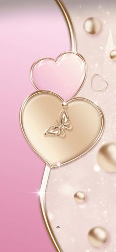 two heart shaped lockes on a pink and white background with bubbles in the air