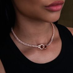 Elevate your style game with the Iced Handcuff Diamond Prong Cuban Necklace. This 14k Rose Gold piece features an iced out Cuban chain connecting two pave handcuffs, each accented with our signature GLD star. Designed to elevate your look in an instant, pair it with the matching bracelet for the perfect set! This product is guaranteed for life - GLD will repair the item should you experience any defects in craftsmanship or breakage. Specifications - Length: 16", 18", 20", & 22" - Width: 6mm - We Cuban Necklace, Vermeil Jewelry, Gold Piece, Matching Bracelet, Custom Earrings, Cuban Chain, Matching Bracelets, Drop Necklace, Pendant Bracelet