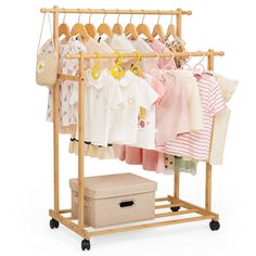 a wooden rack with clothes hanging on it