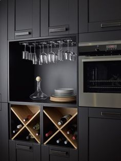 a wine rack in the middle of a kitchen