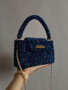 A handmade blue crystal bag is a stylish, elegant and luxurious accessory that you must have. The bag has a magnetic closure and a 1 meter (40 inches) long metal chain. The bag has a super-strong reinforced bottom and lining in the color of beads. This model accommodates: - any size phone - lipstick, cream and other cosmetics -keys -cards and cash - headphones / AirPods - and other items 100% quality handmade Material: crystal beads, strong fishing line Size: length - 19 cm 7.5 inches height - 1 Blue Beaded Bag, Crystal Beaded Bag, Crystal Bead Bag, Long Sleeve Mermaid Prom Dress, Bead Purse, Beads Bag, Bead Bag, Crystal Bags, Pearl Bag