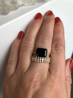 Spin off of our best-selling Onyx Ring, this 3.8ct emerald cut Black Onyx is set horizontally for more unique feel. Set into our signature claw prongs. Subtle, quarter band diamonds, 0.08ct.  Treat with love due to the center stone softness. Band width, 1.5mm In stock: 14k Yellow Gold Elegant Rings With 17 Jewels, Luxury Gemstone Stackable Rings For Formal Occasions, Elegant Formal Stackable Gemstone Rings, Luxury Baguette Cut Stackable Rings For Formal Events, Elegant Stackable Emerald Cut Rings, Elegant Stackable Rings With Emerald Cut, Elegant Stackable Rings For Formal Occasions, Luxury Baguette Cut Stackable Rings For Formal Occasion, Elegant Formal Stackable Rings