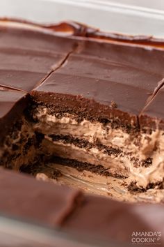 a close up of a cake with chocolate frosting