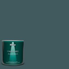 a can of marquee green paint on a green background with the word marquee written below it