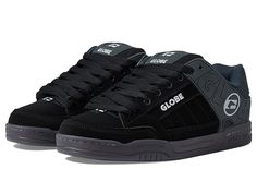 Globe Tilt - Men's Skate Shoes : Black/Brown : Keep your style going strong with the iconic silhouette and cushioned support of the Globe Tilt skate shoes. Skateboard shoes with leather uppers. Large Globe brandings on upper. Flush and stitched PVC lace eyelets. Hidden lacing options in key areas for added lace protection. Thicker outer sidewalls for added durability. Padded tongue and collar for added comfort. Breathable slip-resistant lining for a more stable skate. Cupsole construction. Rubbe Leather Skate Shoes With Laces For Streetwear, Urban Leather Skate Shoes With Laces, Leather Urban Skate Shoes With Laces, Black Skate Shoes With Laces For Skateboarding, Black Skate Shoes With Laces, Low-top Leather Skate Shoes With Padded Tongue, Leather Low-top Skate Shoes With Padded Tongue, Studded Lace-up Sneakers For Skateboarding, Lace-up Sneakers With Padded Tongue For Skateboarding