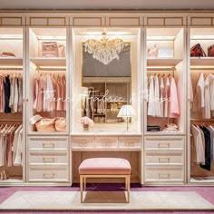 an open closet with clothes and shoes on the shelves, chandelier hanging from the ceiling