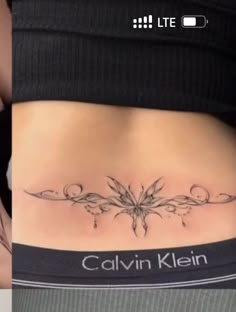 two pictures of the same woman's stomach, one showing her lower back tattoo