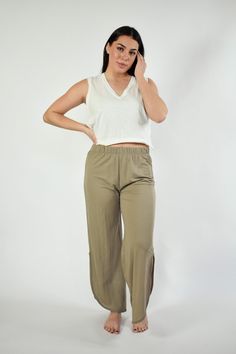 The chicest pair of lounge pants around! Our Casey lounge pants take your loungewear to the next level. Soft, comfortable, and so easy to style - everyone needs a pair of these. Features: Curve Hem Elastic Waist Model is wearing a medium. Height 5'8", Bust 35", Waist 28.5", Hip 34.5" Fabric content: 45% Nylon : 55% Rayon Spring Loungewear Wide Leg Pants With Pull-on Style, Chic Pull-on Style Wide Leg Pants For Loungewear, Chic Wide Leg Loungewear Pants With Pull-on Style, Spring Wide Leg Lounge Pants With Pull-on Style, Spring Wide Leg Pull-on Pants, Ankle-length Wide Leg Pull-on Loungewear Pants, Effortless Spring Loungewear Bottoms, Cotton Sweatpants Relaxed Fit For Day Out, Stretch Wide-leg Harem Pants For Loungewear