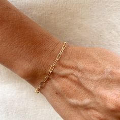 Dainty and perfect as a stackable option. 18k Gold Filled Short Link Paperclip Bracelet Metal : 18k Gold Filled Link size: 3 mm wide x 8 mm long Available sizes: 6 inches 7 inches and 7 inches with 2 inches extender. Hypoallergenic jewelry - Nickel Free Water-resistant Rigorously manufactured under CA Prop 65 and EU standards Handcrafted in Brazil. Dainty Gold Paperclip Bracelet Stackable Gold Link Bracelet Short Link Paperclip Bracelet 18k Gold Filled Bracelet Delicate Gold Chain Bracelet Stackable Paperclip Jewelry Hypoallergenic Gold Bracelet Waterproof Paperclip Bracelet Elegant Short Link Bracelet Handcrafted Gold Filled Bracelet Versatile Stackable Bracelet Everyday Wear Gold Bracelet Statement Paperclip Bracelet Fashionable Gold Link Bracelet Gift-Worthy Gold Filled Bracelet Minimal Classic Everyday Bracelets With Spring Ring Clasp, Everyday 14k Gold Bracelet With Spring Ring Clasp, Adjustable Gold-tone Paperclip Bracelet For Everyday, Everyday Yellow Gold Bangle Charm Bracelet, Adjustable Yellow Gold Plated Paperclip Bracelet, Adjustable Link Gold Bracelet For Everyday, Rectangular Paperclip Bracelet With Lobster Clasp, Adjustable Tarnish Resistant Paperclip Bracelet As Gift, Adjustable Tarnish-resistant Paperclip Bracelet Gift