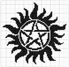 a cross stitch pattern with black and white designs