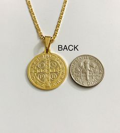 "18K GOLD FILLED SAINT BENEDICT NECKLACE 20\" LONG... FOR GOOD LUCK ,PROSPERITY AND PROTECTION. PENDANT : 30 mm x 20 mm 18K GOLD FILLED CADENA DE SAN BENITO 20\" LARGO ..PARA PROSPERIDAD, BUENA SUERTE Y PROTECCION. DIJE: 30 mm x 20 mm" Gold Medallion Necklace For Good Luck, Gold Good Luck Charm Necklace Nickel Free, Gold Nickel-free Charm Necklaces For Good Luck, Gold Nickel-free Charm Necklace For Good Luck, Gold Blessing Jewelry, Gold Round Jewelry For Blessing, Gold Round Charm Necklaces For Good Luck, Gold Round Pendant Charm Necklace For Blessing, Personalized Gold Necklace For Blessing