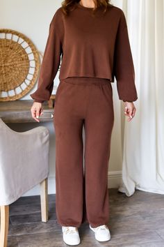 Unwind in style with the Carson Lounge Set. This versatile athleisure set is perfect for any occasion, whether you're lounging at home or on-the-go. Mix and match for endless outfit options. (Stretch, relax, and slay in comfort!) 65% cotton 35% polyester Color: Brown Athleisure Lounge Set Knit Sweat Set & Pants Round Neck Long Sleeves Elastic on waist Cropped Pants Functional pockets For a relaxed fit you can size up Model is wearing a size Small. She is 5'6". 135lbs. Bust: 34C Waist 26" Hips 36 Versatile Solid Color Sweatpants For Loungewear, Casual Activewear For Relaxation, Versatile Activewear For Loungewear, Versatile Solid Color Activewear For Loungewear, Solid Color Athleisure Sets For Leisure, Cozy Relaxed Fit Activewear For Relaxation, Cozy Activewear For Relaxation With Relaxed Fit, Brown Relaxed Fit Sweatpants For Loungewear, Brown Relaxed Fit Athleisure Activewear