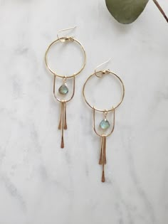 The Solstice Earrings in Moonstone have been a top seller that I decided to design them with Labradorite as well! These beauties are light weight and you can wear them as an everyday earring or take them out on a special night. They are very versatile. Each piece is handmade with your choice of 14K Gold Filled or Sterling Silver. The length of the earrings are just over 3 in. Labradorite is a natural stone and the color may slightly vary. You can see the colors in the 4th picture. Thank you for Nickel-free Labradorite Drop Earrings, Minimalist Brass Earrings With Natural Stones, Teardrop Labradorite Earrings, Labradorite Drop Earrings With Natural Stones, Handmade Labradorite Earrings For Everyday, Nickel-free Labradorite Dangle Earrings, Everyday Dangle Earrings With Natural Stones, Handmade Long Drop Labradorite Earrings, Labradorite Dangle Earrings For Pierced Ears