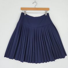 Never Worn Blue Relaxed Skirt With Pleated Hem, Fitted Navy Pleated Skirt With Lining, Navy Fitted Lined Pleated Skirt, Fitted Navy Pleated Lined Skirt, Blue Skirted Bottoms With Pleated Hem, Fitted Blue A-line Pleated Skirt, Tommy Hilfiger Mini Skirt For Spring, Tommy Hilfiger Spring Mini Skirt, Fitted Navy Tennis Skirt For Spring