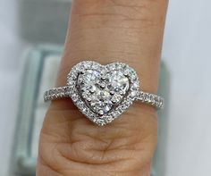 Beautiful Heart Shape Diamond Ring White Gold. Give the gift of love with this stunning ring. Set with very sparkling diamonds. The three center diamonds are good sizes. Excellent craftsmanship, nice and smooth setting. The shape of this heart is very beautiful. The heart measures about 9.8 x 10.9mm. The band is about 1.6mm width. You will love how sparkly this ring is. Clean clean a. diamonds, no black carbon spot even when viewed under a magnifying glass. Genuine round brilliant cut natural di Moissanite Round Cut Diamond Ring For Valentine's Day, Valentine's Day Moissanite Diamond Ring With Round Cut, Moissanite Heart Cut Diamond Ring For Proposal, Heart Cut Moissanite Diamond Ring For Proposal, Diamond Heart Cut Ring For Proposal, Heart Cut Diamond White Ring For Proposal, Heart Shaped Moissanite Diamond Ring With Brilliant Cut, Heart Cut Moissanite Ring With Diamond Accents, Cubic Zirconia Diamond Ring With Brilliant Heart Cut