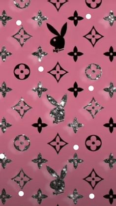 a pink background with black and white designs on it's side, all over the place