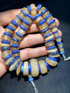 Ancient quartz beads necklace from Neolithic period very good condition and blue color ancient trade glass beads are used as counter beads in between the beads The origin of this bead are from sub Sahara Africa The age of this beads are more than 5000 years old very rare items for collection and study we provide fast and free shipping to our customers by which can get the items by 7 maximum working days Lapis Lazuli Gemstone Beads Crystal Necklace, Lapis Lazuli Crystal Necklace With Gemstone Beads, Artisan Crystal Necklaces With Round Beads For Jewelry Making, Lapis Lazuli Gemstone Beads For Jewelry Making, Unique Crystal Necklaces With Polished Round Beads, Artisan Crystal Necklaces With Round Beads For Healing, Artisan Crystal Necklace With Round Natural Stones, Period Jewelry, Neolithic Period