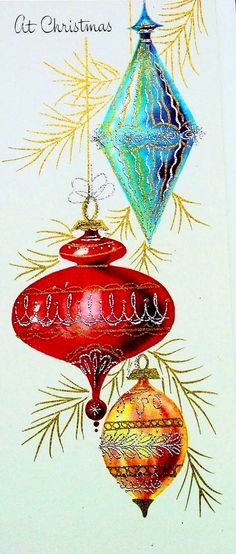 a christmas card with ornaments hanging from it