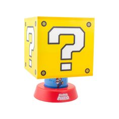 an image of a question box on top of a game stand with the letter q in it