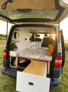 the back end of a van with an open bed