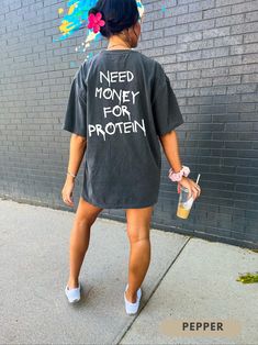 Make a statement with this "Need Money for Protein" t-shirt, designed for fitness lovers and gym enthusiasts. Great for workouts, casual wear, or as a pump cover. Perfect for weightlifters, bodybuilders, and gym rats who appreciate a good laugh! - - RETURNS - - (please read) 🔻 All sales are final! Since all items are custom printed for you - returns and exchanges are NOT accepted. Please reach out if you have any issues with your order. --FIT-- SIZE UP for an OVERSIZED FIT. If you are looking f Relaxed Fit Gym T-shirt With Text Print, Short Sleeve Slogan T-shirt For Athleisure, Oversized Sports T-shirt With Screen Print, Oversized Screen Print Sports T-shirt, Oversized Crew Neck T-shirt For Gym, Workout Graphic Tee With Letter Print, Graphic Tee With Letter Print For Workout, Oversized Cotton T-shirt For Workout, Oversized Letter Print T-shirt For Gym