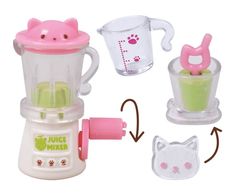 the juice maker has two cups and a cat figure on it's side,