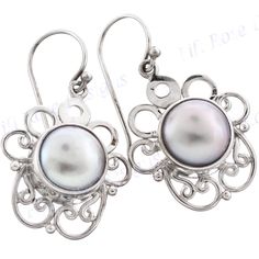 "13/16\" Freshwater Pearl 925 Sterling Silver Earrings Quality handcrafted earrings in 925 sterling silver. Please look at the finesse of the settings and excellent polish of the silver. A trusted designer since 2003. Wholesale discounts and custom design services available to qualified buyers (minimums apply). Hook Type: French wires Silver Type: 925 Sterling Silver Earring Size: 21x18mm(13/16x11/16\")w/o wire Earring Weight: ~3.3grams/ea Earring Material: Freshwater pearl(10mm) Price: 24.95" Hallmarked Sterling Silver Dangle Pearl Earrings, Pierced Sterling Silver Pearl Earrings, Fine Jewelry Sterling Silver Pearl Earrings, Handmade Silver Pearl Earrings For Anniversary, Handmade Silver Pearl Earrings For Formal Occasions, Classic Hallmarked Sterling Silver Pearl Earrings, Nickel-free White Gold Pearl Earrings In Sterling Silver, Nickel-free White Gold Sterling Silver Pearl Earrings, Hallmarked Round Sterling Silver Pearl Earrings