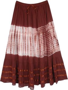 A skirt with a distinct style for this summer due to its white tie dye offset and ribbon details that add a unique character to the overall look.  This three panel skirt is made of 100% soft cotton with matching ribbons at the waistband and at the bottom. #tlb #MaxiSkirt #vacationclothing #beachwrap #TieDye #bohemianfashion #BrownSkirt #VacationSkirt #BeachSkirt #Ribbon Tie Dye Tiered Skirt For Summer, White Hippie Skirt For Spring, Brown Cotton Summer Skirt, Summer Cotton Brown Skirt, White Bohemian Cotton Skirt, Cotton Tie Dye Skirt For Summer, Summer Cotton Tie-dye Skirt, Summer Cotton Tie Dye Skirt, Coco Calypso