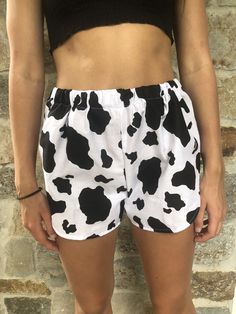 Cow Print Shorts. Great to wear for your next festival. Super cute summer shorts. Super cute and really comfy shorts with a high cut. Made from a 100% cotton fabric with an elastic waist band. Great gift for a birthday, holiday or even a treat for yourself. All of my shorts are made to order so if you have a special request you can leave me a note with your order telling me your exact size specifications. If you don't see your size, if you need the shorts bigger or smaller just tell me and I can Fun Vacation Bottoms With Built-in Shorts, Trendy Bermuda Shorts For Summer, Beachwear Bottoms With Built-in Shorts For Festival, Summer Cotton Bloomers With Elastic Waistband, Fun Bottoms With Elastic Waistband For Vacation, Casual Shorts For Beach Season Festivals, Cute Short Bloomers With Elastic Waistband, Fun Summer Shorts With Elastic Waistband, Fun Bottoms With Built-in Shorts For Beach Season