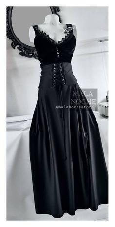 "-Long gothic skirt in stretch Lycra Polyester, eyelets in stain steel and asimetric Silhouette in front. Front opening, fitted at the waist and wide at the hips 100 % Lycra Polyester. -Bra Skull Lace and harness Catedral sold separately. -This item is made to order, i take 1-2 week for your item to be shipped and other 3-9 weeks for arrive depending your country. ** EXPRESS DELIVERY IN ONLY 1 WEEK !! For USA get express delivery by normal delivery for orders starting at $90USD!! -for the length Gothic High Waist Skirt For Alternative Fashion, Gothic High Waist Skirt For Party, Gothic Black Bottoms For Cosplay, Black Gothic Bottoms For Cosplay, Gothic Skirt For Halloween Alternative Fashion, Gothic Black Bottoms For Halloween, Fitted Black Skirt For Halloween, Gothic High Waist Black Skirt, Gothic Skirt Bottoms For Party