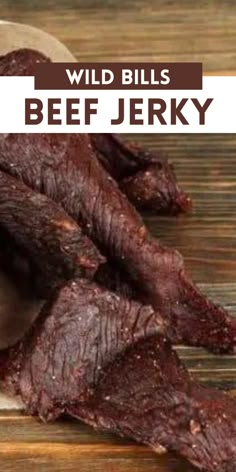 the beef is cut up and ready to be served on the table with text overlay that reads wild bills beef jerry