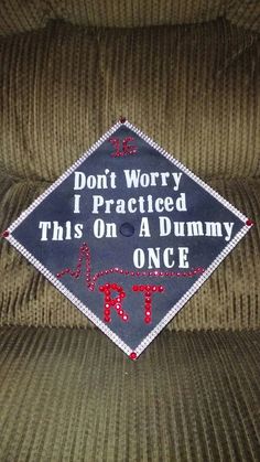 a graduation cap that says, don't worry i practice this on a dummy once