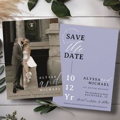 save the date cards with greenery next to them