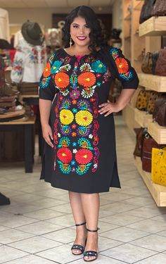 This Beautiful Off the Shoulder Mexican Dress is the perfect Spring & Summer dress. It's lightweight with elastic around the shoulder, made out of cotton and is full of vibrant Colors from top to bottom. This dress has ties on the back in order to adjust the fit. Available size S to 3X The Jewelry modeled may be purchased here: https://www.etsy.com/es/listing/855938626/aretes-mexicanos-de-filigrana-aretes?ref=listings_manager_grid Mexican Plus Size Outfit, Mexican Dresses For Women Plus Size, Traditional Mexican Outfits For Women, Charro Outfits For Women, Mexican Fiesta Party Outfit, Mexican Outfits For Women, Frida Fashion, Mexican Inspired Dress, Mexican Party Dress