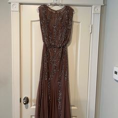 Women Party Dress New Brand:Aidan Mattox Size 8 Color : Sepia / Sequins New With Tag Brown Floor-length Wedding Dress, Elegant Brown Maxi Dress For Wedding, Glamorous Brown Party Dress, Fitted Brown Maxi Dress For Wedding, Party Floor-length Brown Dress, Glamorous Sleeveless Brown Dress, Elegant Long Brown Dress, Sleeveless Embellished Mother Of The Bride Dress For Party, Embellished Sleeveless Mother Of The Bride Dress For Party