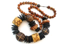 Chunky Wood Bead Necklace Hand Carved Vintage Unique Carved Brown Necklace, Unique Brown Carved Necklace, Vintage Brown Wooden Bead Necklaces, Brown Carved Round Bead Necklaces, Brown Carved Round Beads Necklaces, Rustic Brown Hand-strung Necklaces, Unique Brown Necklace With Large Beads, Unique Brown Necklace With Round Beads, Brown Necklace With Large Beads