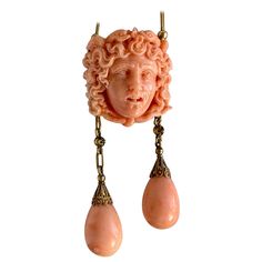 This is a Museum Quality Antique Etruscan Revival Victorian Carved Coral Necklace depicting Medusa with a Crown of Snakes with two pear shape coral drop pendants. The Coral Medusa is set in 14-18 Karat Gold with extraordinary Etruscan Revival beaded cannetille surmounts on the coral drops and a barrel clasp connecting the fine Etruscan gold chain. The necklace is a masterpiece of the period. The three dimensional head of Medusa is exquisitely carved. The face is spectacular with an open mouth an Etruscan Revival Jewelry, Medusa Artwork, Head Of Medusa, Medusa Snake, Cameo Jewelry, Snake Jewelry, Necklace Antique, Gothic Aesthetic, Coral Necklace