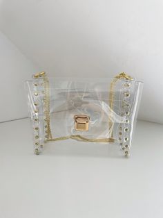 "Please note: We are safe and we fulfill the order as normal, in accordance with the declared deadlines. Clear deluxe bag, transparent glam handbag, vinyl clear bag, premium unique clear bag, transparent purse with chain, mass parties purse Dimensions: 21 x 18 x 11 cm /  8,26\" x 7,01\" x 4,33\" Made of thick, crystalline, flexible PVC, 100% vegan bag! You can use it for shoulder and crossbody. Medium transparent handbag with solid straps to my fascination with the universe transparent .You can complete your harmony as putting some compatible things with your daily dress into the transparent bag and you are ready to go! It's also good when going through airport security. This is no ordinary handbag :) Unconventional addition to the date, wedding, unusual styling to each highlighting your p Trendy Clear Bag With Clear Strap, Trendy Clear Bag With Transparent Straps, Rectangular Plastic Shoulder Bag With Clear Strap, Clear Pvc Bags For Daily Use, Daily Use Clear Pvc Bags, Clear Shoulder Bag With Transparent Straps, Trendy Clear Plastic Bags, Everyday Clear Plastic Bags, Everyday Use Clear Plastic Bags