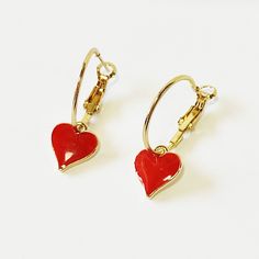 Gold hoop earrings with red hearts, Dangle red hearts earrings, Valetine's day gift, Red heart earrings,Gift for her, Minimalist jewerly Simple gold plated hoop earrings with dangle red resin hearts Details Hoop 2 cm  /  0.78 inches Length 3.2cm / 1.25 inches These hoops are lightweight and comfortable for everyday wear. You can wear these hoops with other earrings or alone for a beautiful classy look. All pieces of jewelry are beautifully packaged, ready to be gifted. More earrings https://www. Red Dangle Hoop Earrings Nickel Free, Red Dangle Hoop Earrings As Gift, Gift Red Nickel Free Hoop Earrings, Gift Red Nickel-free Hoop Earrings, Red Nickel-free Hoop Earrings As Gift, Nickel-free Red Hoop Earrings For Gifts, Red Heart Pendant Earrings, Valentine's Day Heart Charm Dangle Hoop Earrings, Valentine's Day Dangle Hoop Earrings With Heart Charm