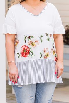 Get ready to add some unpredictable charm to your wardrobe with this top! This ivory top features a unique floral stripe color block design and is made from lightweight fabric! Pair it with your go-to denim or pants for a playful and stylish look! 95% Rayon, 5% Spandex Spring Short Sleeve Top With Striped Hem, Spring Short Sleeve Tops With Striped Sleeves, Spring Tops With Striped Short Sleeves, Spring Top With Striped Short Sleeves, Summer Cotton Blouse With Striped Sleeves, Striped Floral Print Tops For Summer, Spring Day Out Tops With Striped Hem, Casual White Tops With Floral Patchwork, Spring Tops With Striped Hem For Day Out