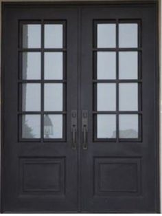 two double doors with sidelights and windows on the front of a house, one is painted black