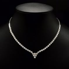 She'll never tire of wearing this classic and sophisticated diamond tennis necklace. Stunning in 18K solid white gold, this breathtaking line of shimmering round diamonds. So elegant, this 18.0-inch diamond necklace will take her breath away. Radiant with 3.08 cts. t.w. of diamonds and buffed to a brilliant luster, this glamorous keepsake secures with a box clasp. The setting design make the diamonds look much bigger than they are. When worn, the diamonds look like 1/5 carat each. Diamonds Detai Diamond Necklace Expensive, Fake Diamond Necklace, One Line Diamond Necklace, Dimond Neckles, Luxury Necklace Diamonds, Diamond Necklace Elegant, Elegant Diamond Necklace, Modern Necklace Design, Infinity Signs