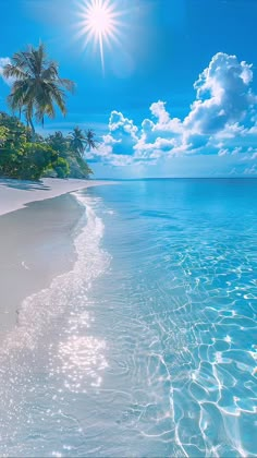 the sun shines brightly over an ocean beach with white sand and clear blue water