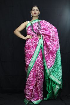 Exclusive hand-woven Sambalpuri silk saree with Pasapali Finest pure handwoven sambalpuri ikat silk saree with traditional motifs woven by the master weavers of Sambalpur, Odisha. It has lovely patterns and is world-famous for its stunning colours, texture and designs. Occasion: Party Wear Fabric: Sambalpuri Primary Color: Pink Secondary Color: Green Material: Mulberry Silk/ Sambalpuri Silk Pattern: Motif Border Type: Ikkat Border Size: Medium Blouse Piece: Included Care: Dry Clean Disclaimer : This is a genuine handwoven piece, unevenness in the selvedge and weave could be expected and colours may fade or bleed due to the traditional dyeing method employed. Multicolor Ikat Print Katan Silk Saree, Navratri Silk Traditional Wear With Ikat Print, Navratri Ikat Print Silk Traditional Wear, Traditional Wear Katan Silk With Ikat Print, Traditional Wear With Ikat Print In Katan Silk, Traditional Wear In Katan Silk With Ikat Print, Traditional Wear In Ikat Print Katan Silk, Multicolor Silk Saree With Ikat Print, Festive Katan Silk Traditional Wear With Ikat Print