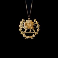 Elevate your style with our 14k Gold Lion Sun Pendant. This solid gold necklace showcases exquisite craftsmanship, symbolizing the strength and vitality of the lion and the sun. The 14 karat gold Lion Sun pendant is more than just jewelry; it's a fine representation of symbolism and beauty, also available in 18k yellow gold. PENDANT INFORMATIONThis pendant is made of real, solid gold.• Made in USA• Material: 14k or 18k solid gold• Finish: polished• Height: 1.15" (29 cm) | *includes the small cir Lion Accessories, Lion Pendant Gold, Sun Pendant Gold, Lion And Sun, Lion Queen, Persian Jewelry, Gold Coin Jewelry, Lion Jewelry, Majestic Lion